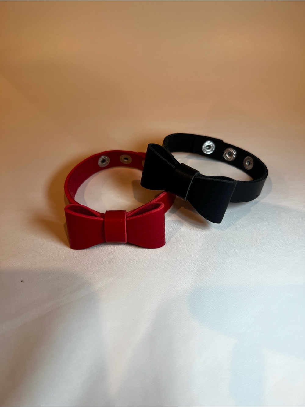 Bundle lot of 2 brand new PU leather bow red n black snap bracelet